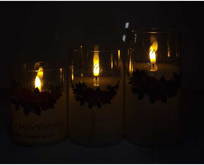 Szeroka świeca LED w tubie z kwiatami i napisem "Pamiętamy" - różne wymiary