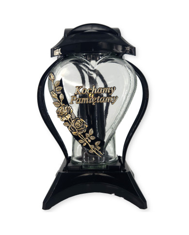 Duży znicz z napisem "Kochamy Pamiętamy" i ozdobnym kwiatem Duży znicz z napisem "Kochamy Pamiętamy" i ozdobnym kwiatem